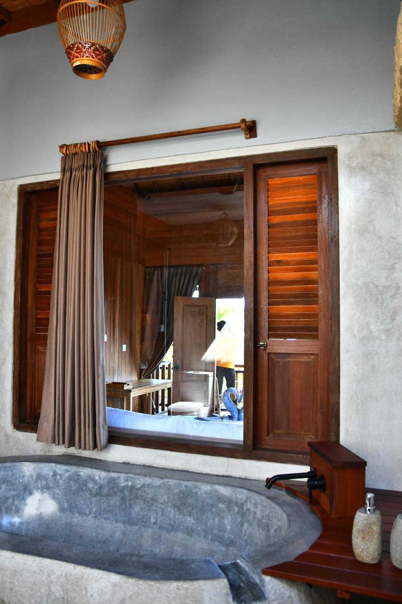 Putra'Lebah Amed Guest House Kültér fotó